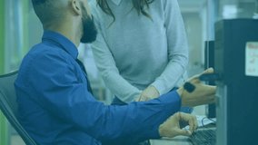 Man discussing data processing animation with colleague in modern office setting. Business, technology, teamwork, collaboration, meeting, communication - Powered by Shutterstock - Get 15% off with code: PIKWIZARD15