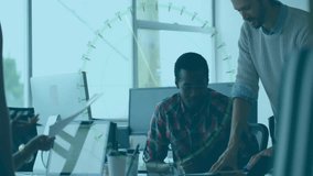 Diverse team collaborating at office desk with digital data overlay animation. Teamwork, collaboration, brainstorming, technology, innovation, business - Powered by Shutterstock - Get 15% off with code: PIKWIZARD15