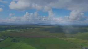 Digital interface animation overlaying green landscape with cloudy sky in background. Technology, innovation, data, nature, futuristic, environment - Powered by Shutterstock - Get 15% off with code: PIKWIZARD15