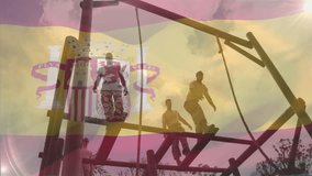 Climbing obstacle course, people with Spanish flag animation in background. Adventure, teamwork, challenge, outdoor, competition, fitness - Powered by Shutterstock - Get 15% off with code: PIKWIZARD15