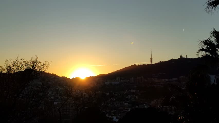 The moment the Sun sets behind Collserola Mountain in Barcelona on the shortest days of the year