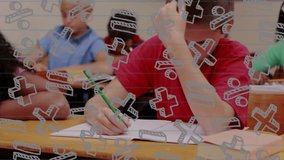 In school, child writing at desk, math symbols and animation overlaying scene. Education, mathematics, learning, studying, creativity, knowledge - Powered by Shutterstock - Get 15% off with code: PIKWIZARD15