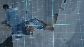 Using tablet with digital grid, medical professionals analyzing data in hospital. Healthcare, technology, innovation, collaboration, analysis, data-driven - Powered by Shutterstock - Get 15% off with code: PIKWIZARD15