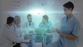 In hospital meeting, medical professionals analyzing data with digital interface overlay. Healthcare, technology, analysis, teamwork, innovation, digital health - Powered by Shutterstock - Get 15% off with code: PIKWIZARD15