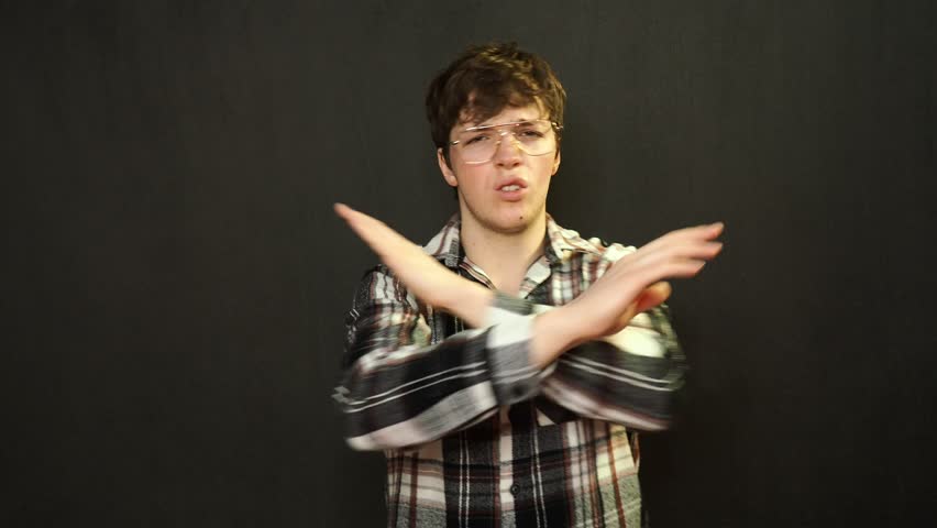 A young attractive student shows the direction.