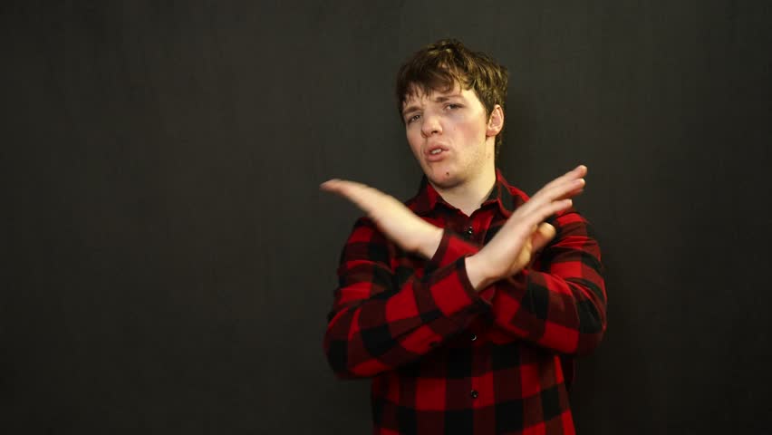 A young attractive student shows the direction.