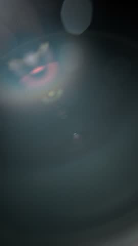 Slow motion real lens flare through glass effects for overlay or transition