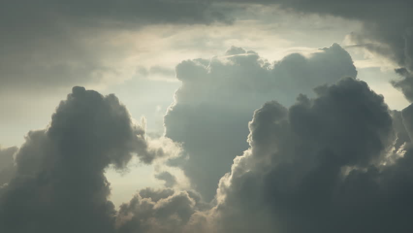 Cloud formation timelapse. Silvery light pearl clouds gradually turn into one big gray cloud. Rays of sun break through from above. Video with no people for background. Cinematic amazing nature.