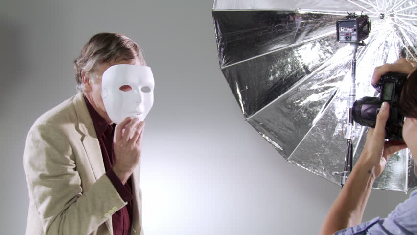 Photographer captures images of the actor/celebrity behind the mask. Edgy,