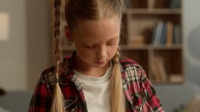 Creative Caucasian schoolgirl primary kid pupil making craft origami homework at home learner daughter do handmade card gift for parent school task little child girl folding paper hobby leisure indoor - Powered by Shutterstock - Get 15% off with code: PIKWIZARD15