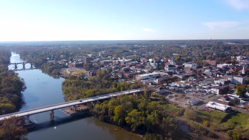 Fredericksburg Virginia aerial cinematic video of the skyline and Rappahannock River during autumn.