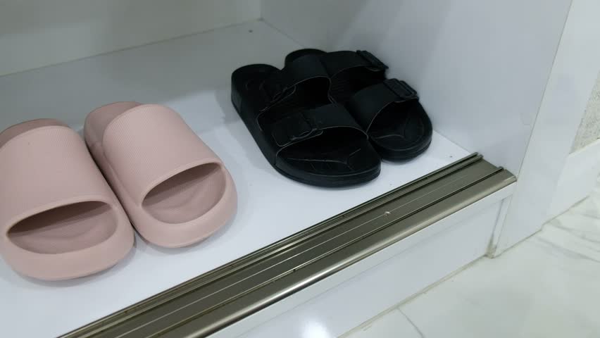 Screwing Metal Bracket onto Shoe Cabinet with Cordless Drill at Home