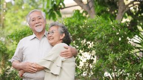 Happy Asian family senior couple enjoy leisure activity lifestyle relaxing and having afternoon tea party together in the garden at home. Elderly retired people healthcare and mental health concept. - Powered by Shutterstock - Get 15% off with code: PIKWIZARD15