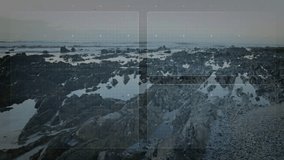 Digital interface with globe and radar animation over rocky coastal landscape. Technology, global, futuristic, networking, overlay, innovation - Powered by Shutterstock - Get 15% off with code: PIKWIZARD15