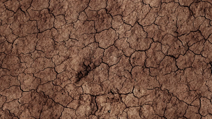 Top view of dry cracked soil during drought background, 4k