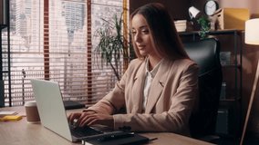 Confident dreamy successful Caucasian business woman female lawyer entrepreneur girl businesswoman office worker agent working computer typing laptop brainstorming thinking daydreaming ponder indoors - Powered by Shutterstock - Get 15% off with code: PIKWIZARD15