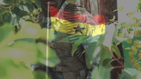 Aiming through foliage, soldier in jungle with Ghana flag animation overlay. Military, camouflage, army, patriotism, tactical, action - Powered by Shutterstock - Get 15% off with code: PIKWIZARD15