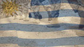 Marching military boots over Uruguay flag with sun emblem in animation. Patriotism, nationalism, defense, identity, symbol, unity - Powered by Shutterstock - Get 15% off with code: PIKWIZARD15