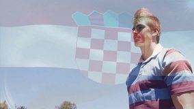 In park, two people with Croatian flag animation overlay on image. Celebration, patriotism, national pride, summer, outdoor, freedom - Powered by Shutterstock - Get 15% off with code: PIKWIZARD15