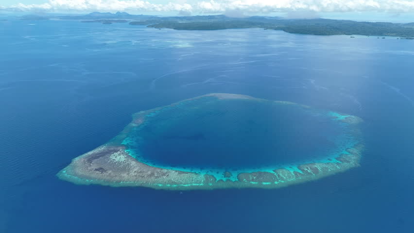 A scenic atoll is found in the Gulf of Tomini, not far from the Togian Islands of Indonesia. This beautiful area, just south of the equator, is home to an incredible array of marine biodiversity.