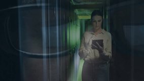 Woman using tablet in server room with digital data overlay animation. Technology, cybersecurity, networking, analysis - Powered by Shutterstock - Get 15% off with code: PIKWIZARD15
