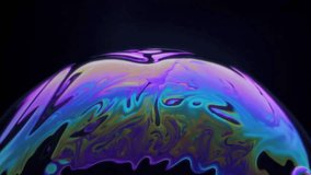 Stunning and beautiful images of a colorful soap bubble showcasing captivating, iridescent patterns that mesmerize - Powered by Shutterstock - Get 15% off with code: PIKWIZARD15