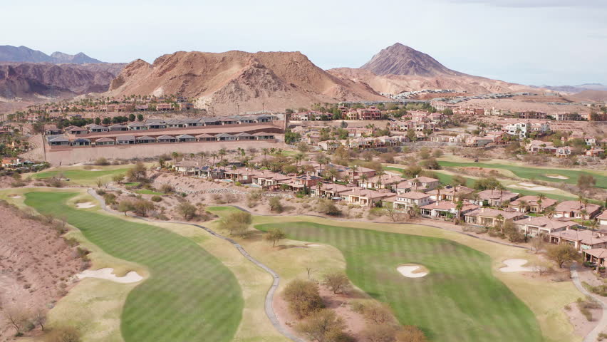 Aerial drone shot of Lake Las Vegas Nevada residential homes, trees, mountain 08 - Aerial Drone View