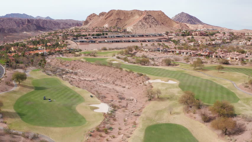 Aerial drone shot of Lake Las Vegas Nevada residential homes, trees, mountain 05 - Aerial Drone View
