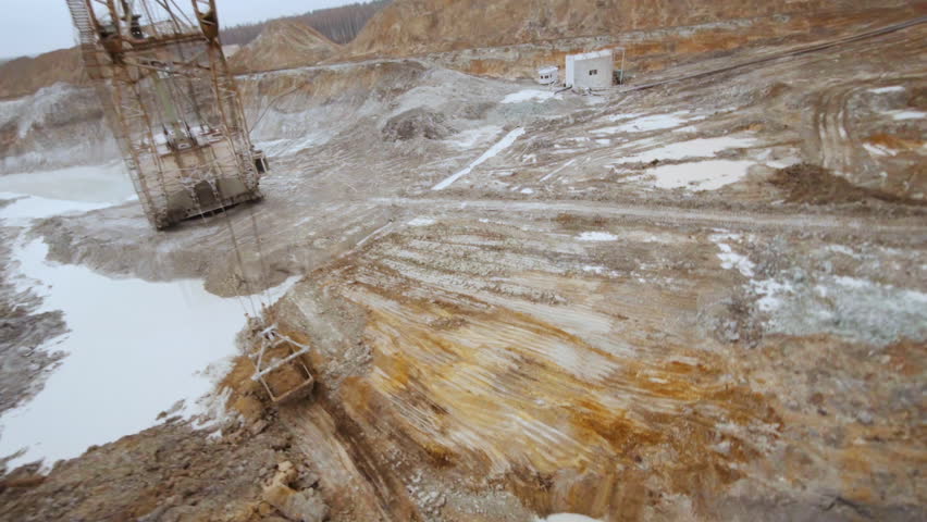 Exploring a dragline excavator at a titanium dioxide mining site with drone footage