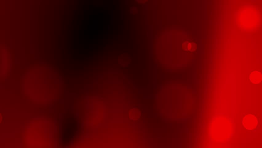 A vibrant dark red video background with soft bokeh effects, creating an intense and dynamic mood.
