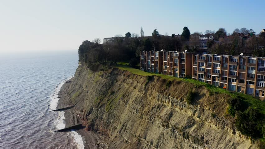 Coastal cliffs, Penarth, Wales modern homes perched above the sea, scenic aerial view