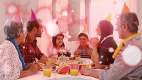 Celebrating birthday, family with cake and party hats at dining table. Celebration, family time, togetherness, happiness, joyful, cheerful - Powered by Shutterstock - Get 15% off with code: PIKWIZARD15