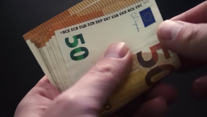 Counting money by hand, 50 euro paper money, real time video - Powered by Shutterstock - Get 15% off with code: PIKWIZARD15