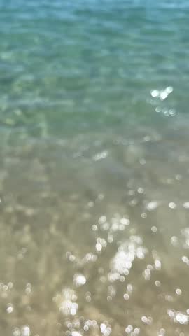 Ocean surface with gentle waves and sunlight reflections

Calm ocean surface with soft, gentle waves and natural sunlight reflections. Peaceful sea movement in a minimal, relaxing summer seascape.