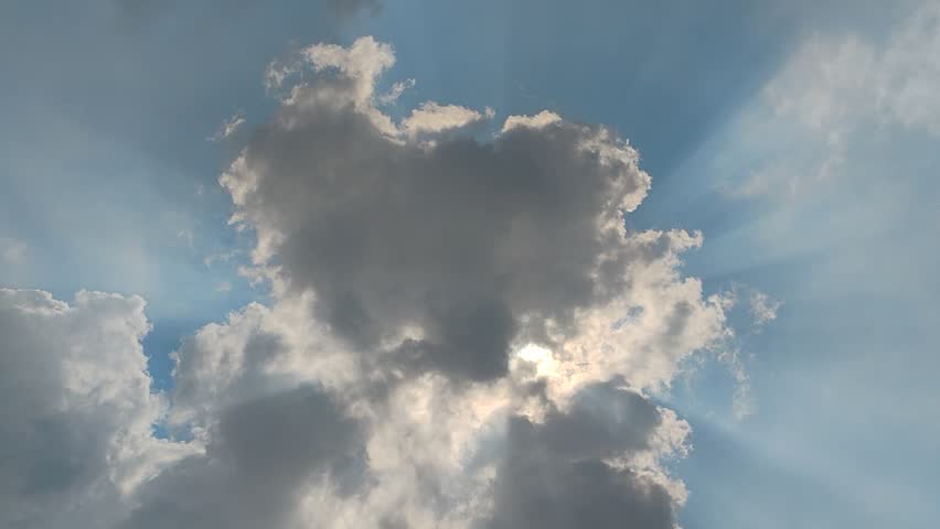 Grey cumulus clouds with a heart shape are visible in the morning sky - Powered by Shutterstock - Get 15% off with code: PIKWIZARD15