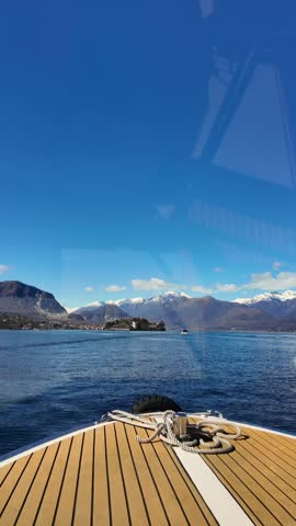  slow mo video from the speedboat bow sailing at Italian Maggiore lake with the Isola Bella in sunny day
