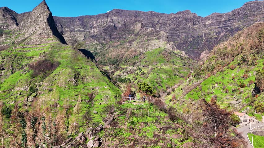 Rotating Aerial View of Miradouro Pico da Murta Showcasing Breathtaking Mountain Landscapes, Madeira Island