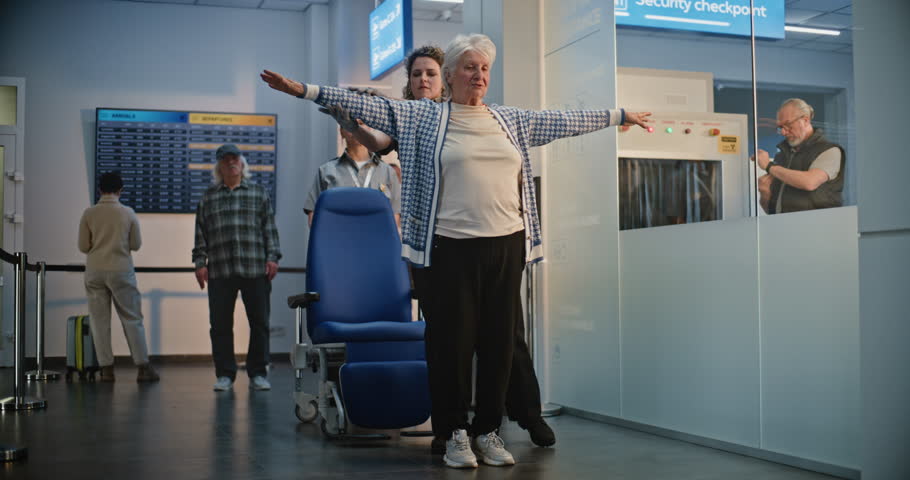 Security Checkpoint in Airport Terminal: Diverse Security Officers Inspecting Elderly Woman in Wheelchair and Elderly Man for Boarding Flight. TSA Screening Procedures. Senior Tourists Going on Trip.