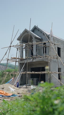 luxurious house under construction in the valley near the forest between the mountains in vietnam