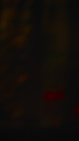 A fast-paced swish pan of a vibrant cityscape at night, featuring streaking neon lights and dynamic motion blur effects