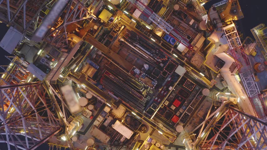 Aerial view of an offshore jack up drilling rig during sunset - oil and gas upstream industry
