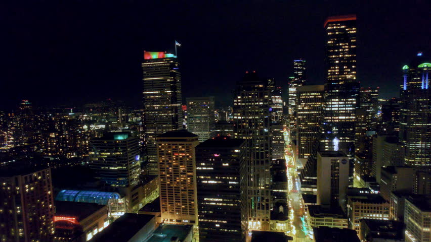 Establishing Downtown Seattle Cityscape at Night Drone Shot