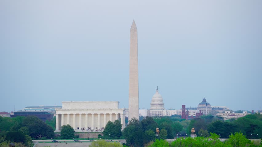 Washington D.C. Skyline after sunset of the Washington Monument, Lincoln Memorial, and US Capitol building.