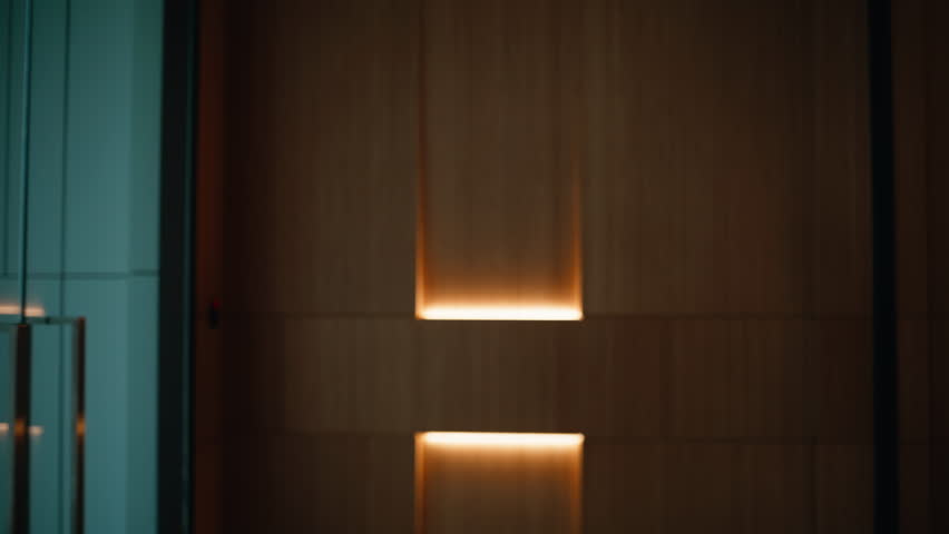 Rich business woman walking office corridor wearing elegant white blouse closeup. Successful businesswoman checking time on hand watch hurrying on meeting. Smiling female boss going on modern hallway.