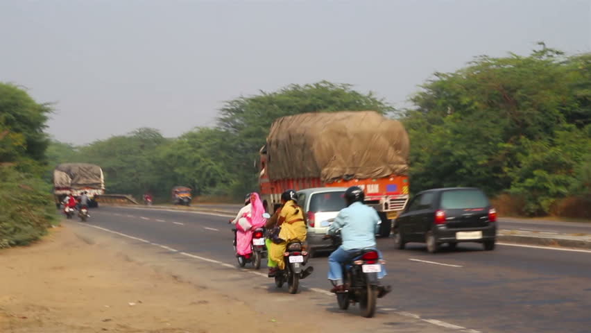 AGRA, INDIA - NOVEMBER 16, 2012: Traffic on indian road in Agra, India, 16 nov