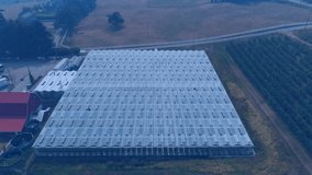 Animation of stock market graphs overlaying large industrial building exterior. Finance, economy, analytics, industry, business, growth - Powered by Shutterstock - Get 15% off with code: PIKWIZARD15