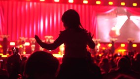 Happy little girl sit her dad shoulders. Small kid have fun live music concert. Cool neon night. Child enjoy disco party. Joyful childhood. Daughter hang out, pop show Family band fan. People raise up - Powered by Shutterstock - Get 15% off with code: PIKWIZARD15