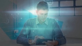 Man working at desk with digital data processing animation overlay. Technology, innovation, futuristic, workspace, computer, analytics - Powered by Shutterstock - Get 15% off with code: PIKWIZARD15