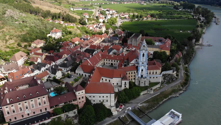 Durnstein, small town in Austria region Wachau. Durnstein town view with Danube river and vineyards.