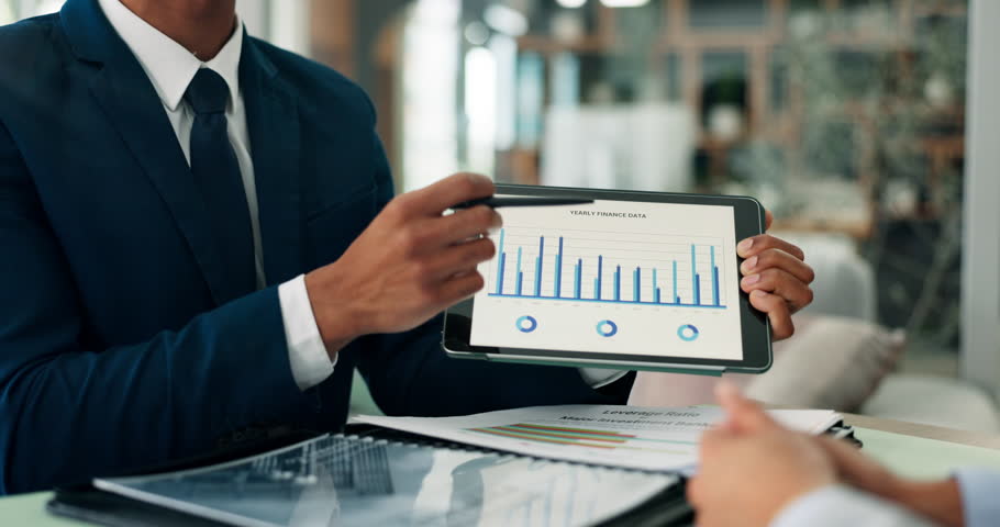 Consulting, finance and infographic on tablet screen with business people in office for investment growth. Data, money and portfolio with financial advisor speaking to client for wealth management